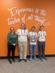 First place: Pattonville High School Capstoners, Elisha Dukes, Matthew Wasser and Rhys Harden, with Stephanie Carson, teacher