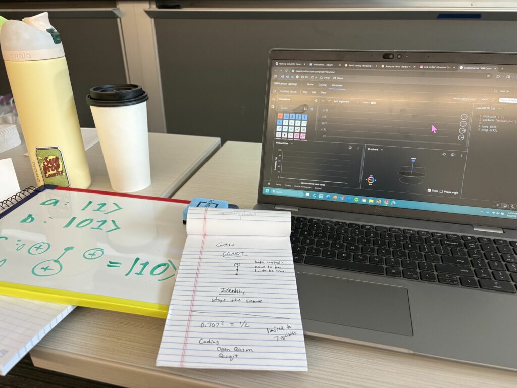 Laptop and nootes calculating Bloch Sphere simulations.