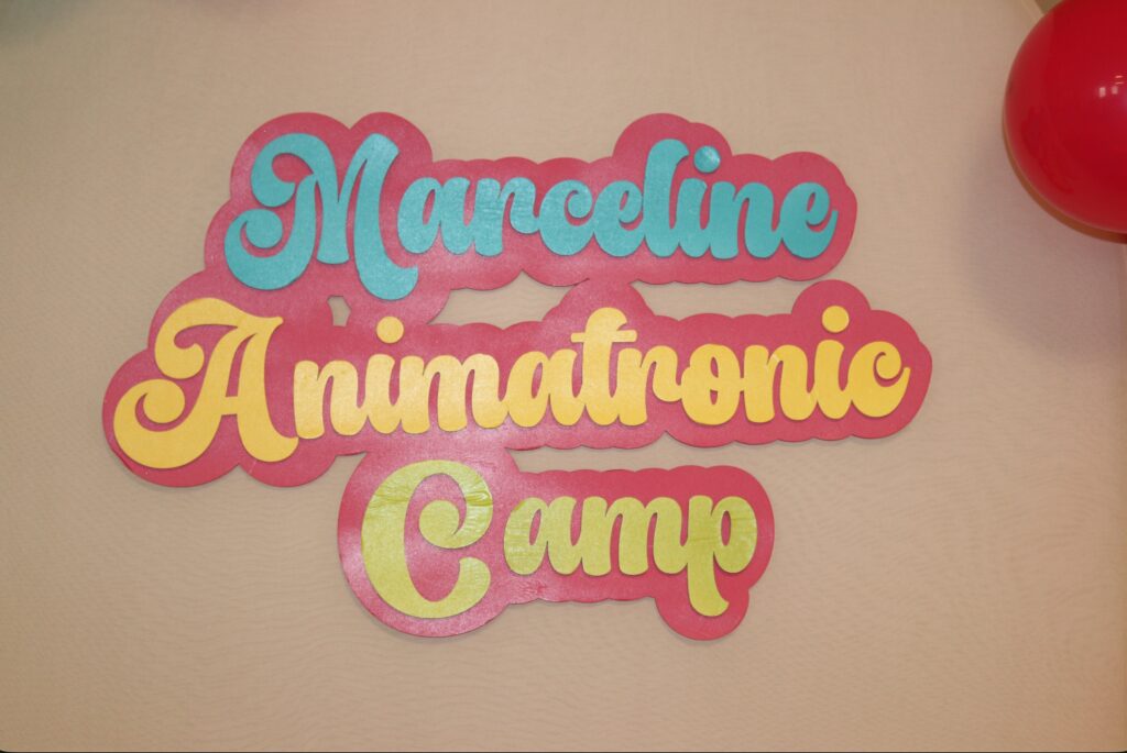 Image of show banner with the words "Marceline Animatronic Camp"